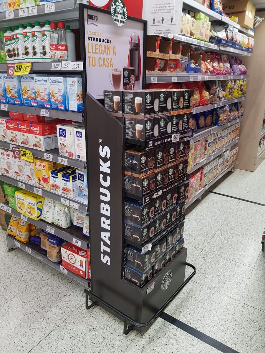 Puntera de Starbucks para cápsulas de café en góndola